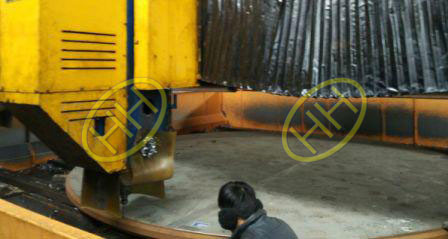 Engineer checking CNC program for drilling tube sheet