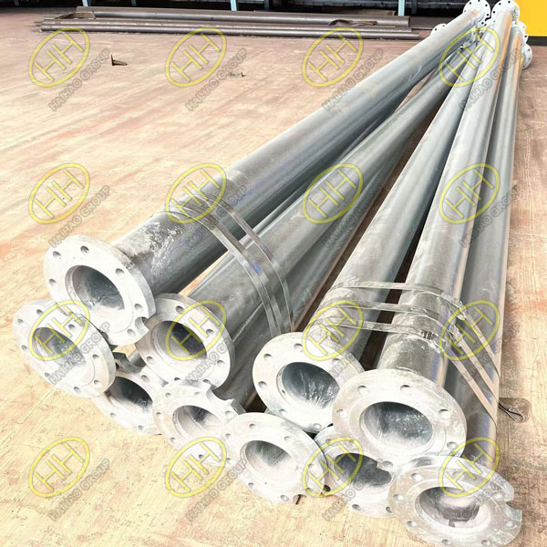 Production process where flange and base pipe are welded together